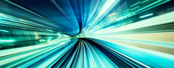 Abstract green blue fast moving tunnel